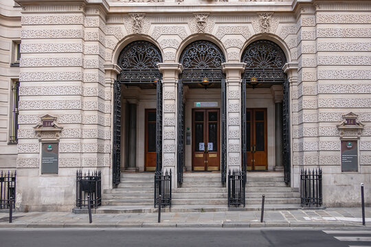 Fragments of the BNP Paribas (BNPP) building on 14 rue Bergere (1881, architect Edouard Jules Corroyer). BNPP is a French commercial bank with a presence in 65 countries. Paris, France. MAY 12, 2023.