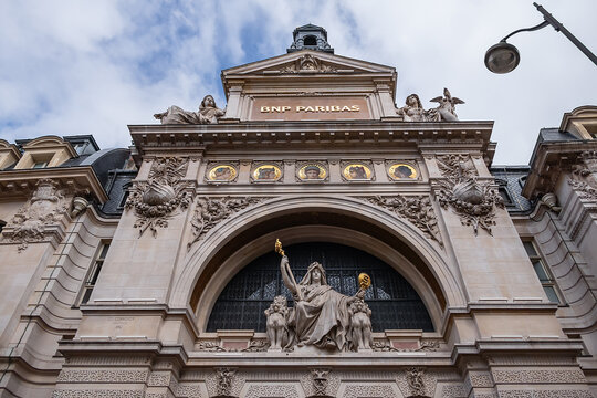 Fragments of the BNP Paribas (BNPP) building on 14 rue Bergere (1881, architect Edouard Jules Corroyer). BNPP is a French commercial bank with a presence in 65 countries. Paris, France. MAY 12, 2023.