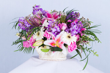ฺBeautiful bouquet of flowers arranged in a basket