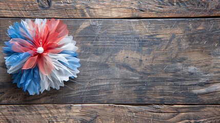 A tricolor cockade pinned against a rustic wooden table