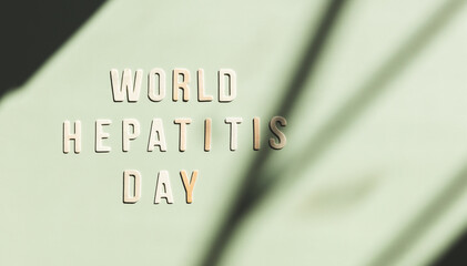 Wooden letters in the phrase World Hepatitis Day.