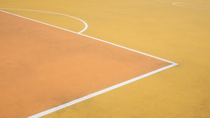 Colorful yellow, orange, soccer field with white lines