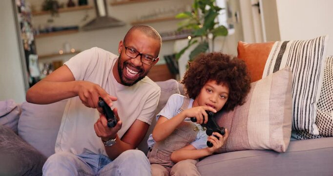 Happy dad, child and video games with controller on sofa for fun bonding, leisure or weekend at home. Excited father with son, little boy or kid playing on console in racing match or esports at house