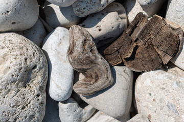 abstract driftwood pieces and stones