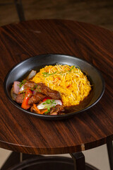 Risoto a la huancaina con lomo saltado peruano