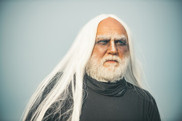 Devil man on Halloween night. Halloween bearded man with blood make-up. Halloween concept. Devil...