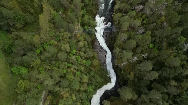 Scenic aerial reveal shot of Kylling railway bridge in Verma, Norway