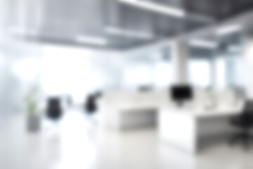 Blur open office with soft sunlight at big window for background usage. blur interior background concept. white and bright tone.
