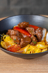 Peruvian fettuccini whit grilled meat