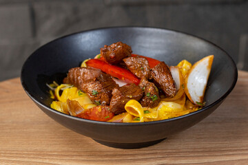 Peruvian fettuccini whit grilled meat