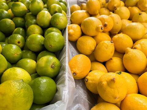 piles of limes and lemons at the markets