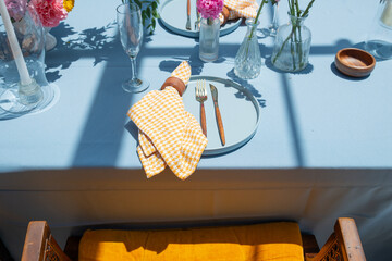 Pastel themed table setting with beautiful vintage seating