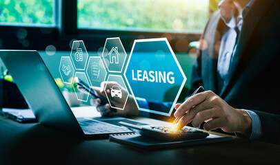 Businessman Using Digital Interface to Analyze Leasing Options and Financial Agreements for Property and Vehicles, Featuring Icons for Finance, Contract Management, and Investment Planning