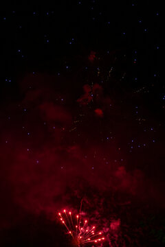 Glowing firework in a hazy sjy