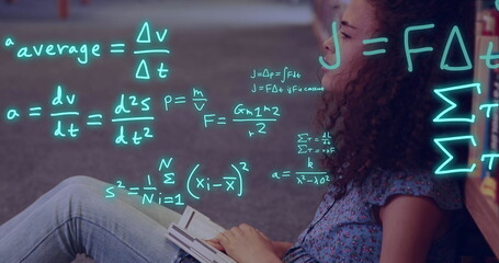 Image of equations and data processing over biracial female student reading