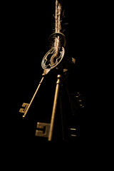 Vintage Skeleton Keys Against Black Background