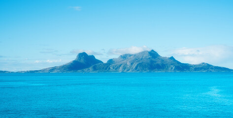 Naklejka premium North, water or landscape of mountains with natural environment or arctic circle in Norway. Zen lake, calm peace or scenic view of Europe in remote area for outdoor travel, holiday and vacation break