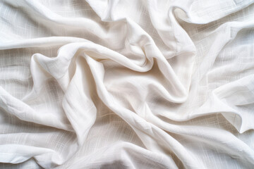 Soft, crumpled white fabric with subtle texture. Ideal for backgrounds, textiles, design projects, and creative applications in graphy and digital media.