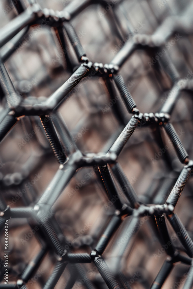 Poster close-up of a hexagonal metallic structure, showcasing futuristic design and technology concepts in 
