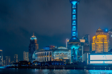 Obraz premium Urban skyscrapers in Shanghai at night; 