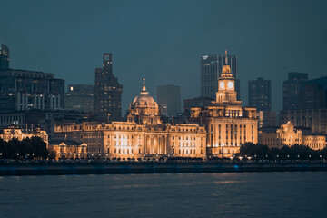 Obraz premium Urban skyscrapers in Shanghai at night; 