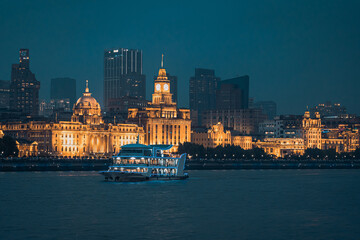 Obraz premium Urban skyscrapers in Shanghai at night; 