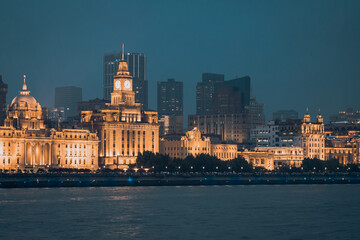 Obraz premium Urban skyscrapers in Shanghai at night; 