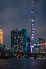 Obraz premium Urban skyscrapers in Shanghai at night; 