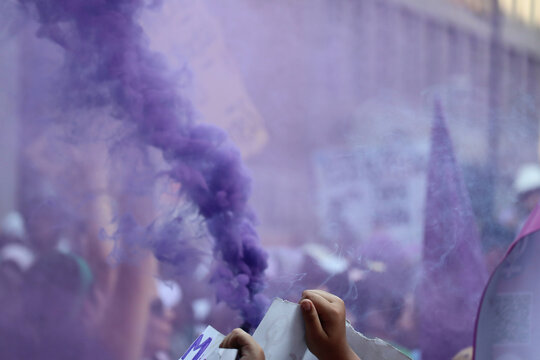 Smoke protest crowd women's march 8m