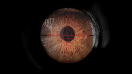 A sniper looking through the scope of his weapon.