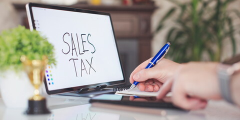 Sales tax note. Business concept of the amount of money a company pays its employees, paying taxes