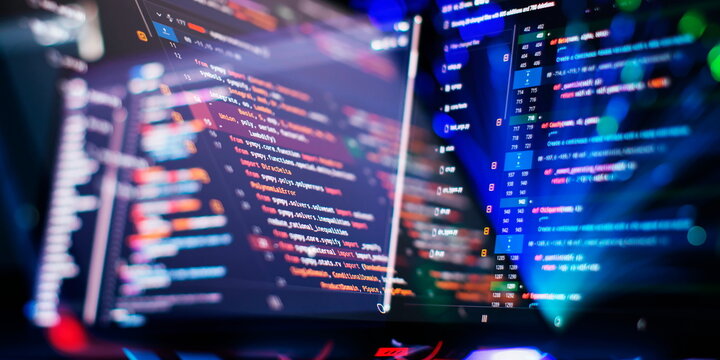 Modern tech. PHP syntax highlighted. Writing programming functions on laptop. Big data and Internet of things trend