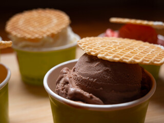 Chocolate Ice Cream gelato in a compostable cup and round wafer