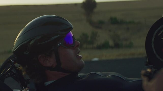 Para Athlete cycling on the road and exercising alone