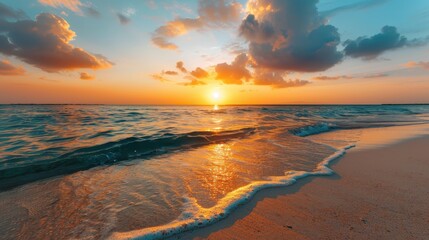 A picturesque beach sunset with serene waves caressing the golden sand, the setting sun casting a magnificent glow over the water and the sky filled with vibrant colors.