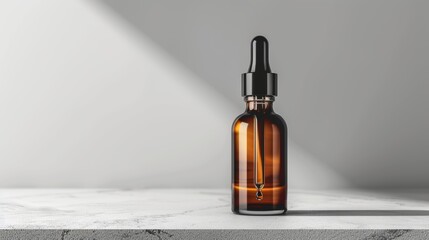 Fototapeta premium Glass bottle containing a serum for skincare displayed on a plain white surface. Presentation of a dropper attached to the container.