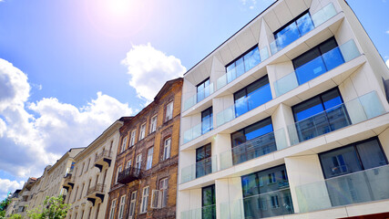 Obraz premium European residential architecture. Elements of modern architecture in apartment building. The facade of the building is made modern panels of different shades. 