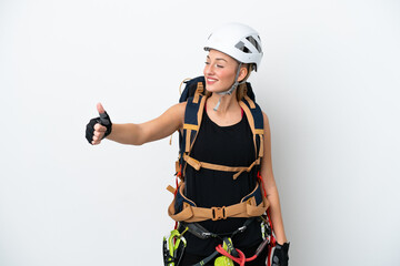 Young caucasian rock climber woman isolated on white background giving a thumbs up gesture