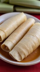 Naklejka premium Mexican tamales food on vertical background.