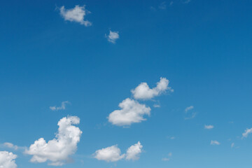 Blue sky with some white clouds. Without overexposure.