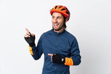 Young cyclist man isolated on white background intending to realizes the solution while lifting a finger up