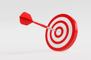 Red dart hitting center of target on white background