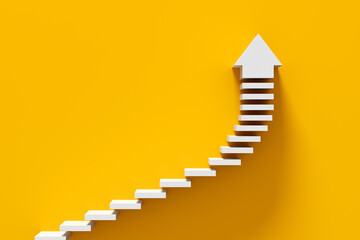 White stairs leading to an arrow pointing up on yellow background