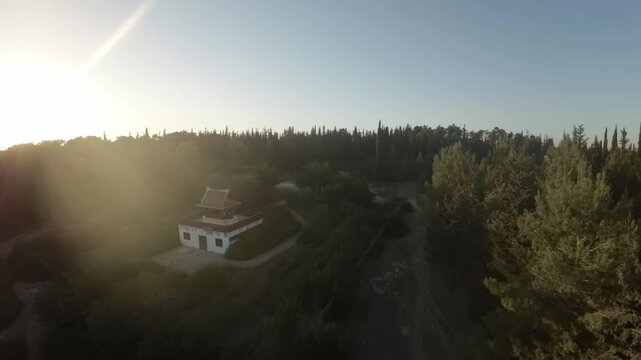 Aerial FPV video over the Ben Shemen forest on a sunny day in Israel