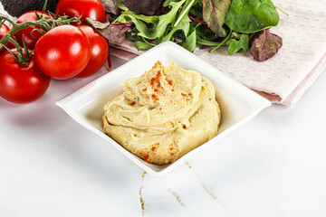 Creamy hummus in the bowl