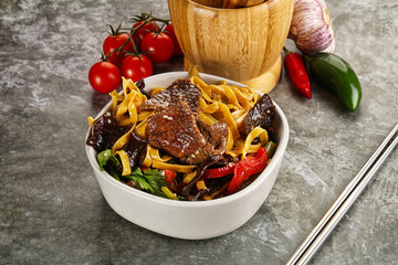 Asian wok with noodle, vegetables and beef