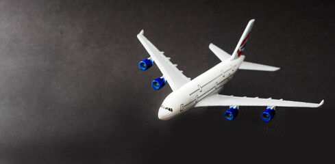Model plane, airplane on dark background.