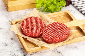 Raw beef  burger cutlet for grill