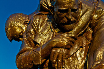 World War One history : bronze sculpture by Peter Corlett (the Cobbers Memorial). Fromelles WW1 battlefield site, France.