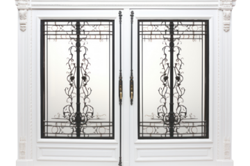 A classic French door with glass panels and ornate ironwork. Isolated on white background.